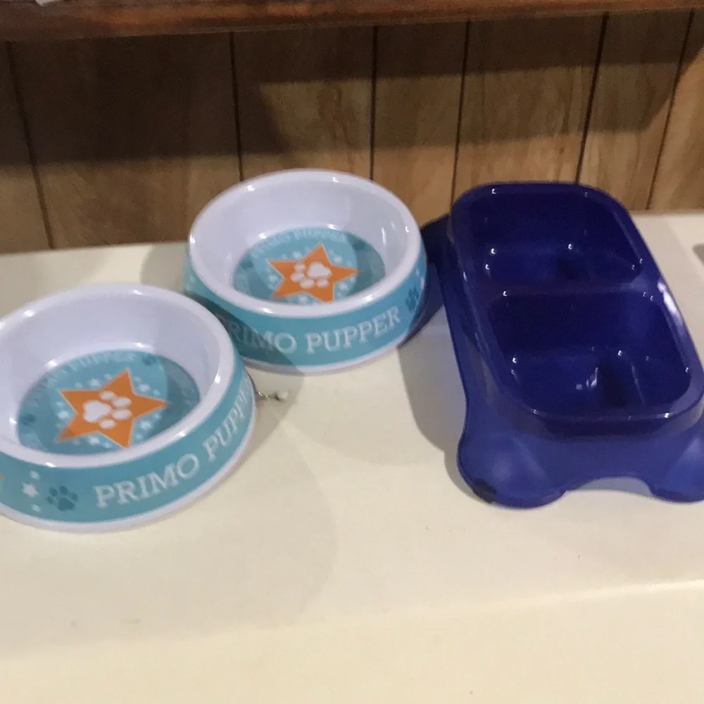 2 round dog bowls and one with 2 bowls.